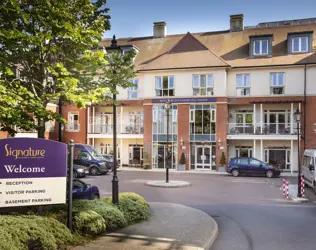 Signature at Coombe Hill Manor - outside view of care home